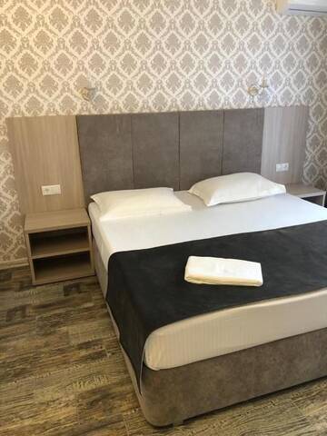 Фото номера Двухместный номер с 1 кроватью и балконом Отель RIT Hotel г. Гагра 3