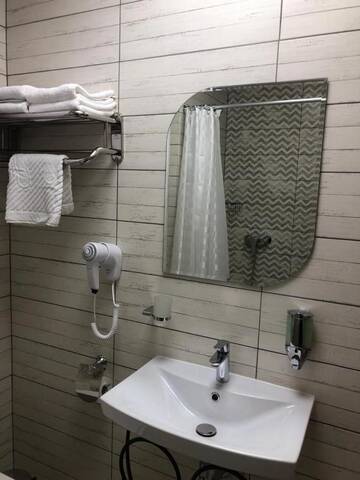 Фото номера Двухместный номер с 1 кроватью и балконом Отель RIT Hotel г. Гагра 7