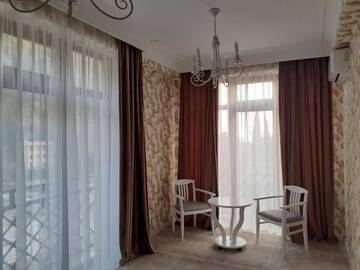 Фото номера Люкс с кроватью размера «king-size» и балконом Отель RIT Hotel г. Гагра 2