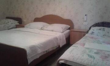 Фото номера Четырехместный номер Гостевой дом Abkhazkiy dvorik г. Гагра 13