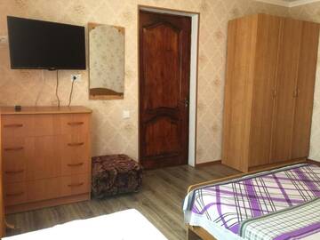Фото номера Четырехместный номер Гостевой дом Abkhazkiy dvorik г. Гагра 5