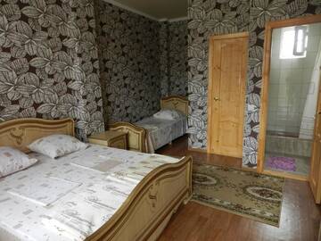 Фото номера Трехместный номер Гостевой дом Viphezda Guest House г. Гагра 11
