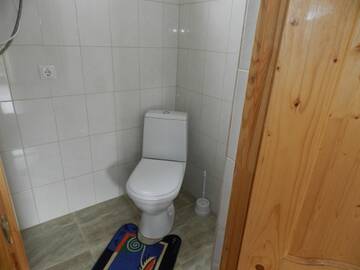Фото номера Двухместный номер с двуспальной кроватью и дополнительной кроватью Гостевой дом Viphezda Guest House г. Гагра 5