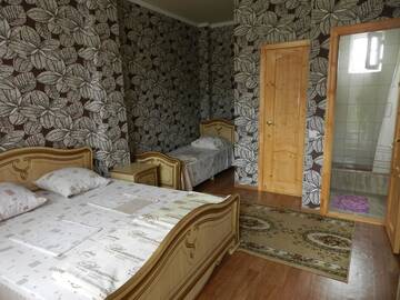 Фото номера Трехместный номер Гостевой дом Viphezda Guest House г. Гагра 6