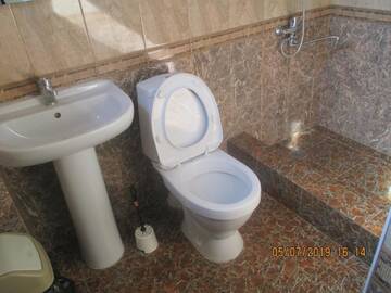 Фото номера Стандартный трехместный номер Гостевой дом Guest House У Маргариты г. Гагра 8