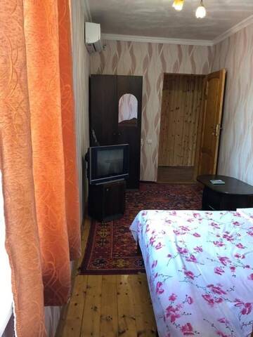 Фото номера Двухместный номер Делюкс с 1 кроватью и душем Гостевой дом В гостях у Кристины г. Гагра 12