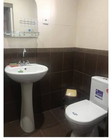 Фото номера Трехместный номер с ванной комнатой Гостевой дом Diana Guesthouse г. Гагра 5
