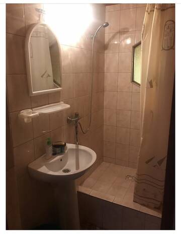 Фото номера Четырехместный номер с террасой Гостевой дом Diana Guesthouse г. Гагра 11