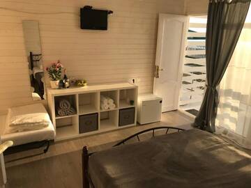 Фото номера Трехместный номер с видом на море Кемпинги “Black Sea” cottages г. Гагра 48