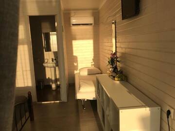 Фото номера Трехместный номер с видом на море Кемпинги “Black Sea” cottages г. Гагра 45