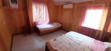 Фото номера Классический трехместный номер Гостевой дом В гостях у Бадри г. Гагра 2