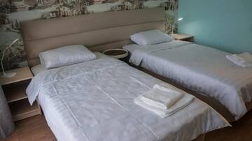 Фото номера Двухместный номер с 2 отдельными кроватями и балконом Отель Лаванда г. Гагра 3