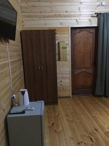 Фото номера Дом с 1 спальней Дома для отпуска Коттеджи у Заура г. Гагра 12